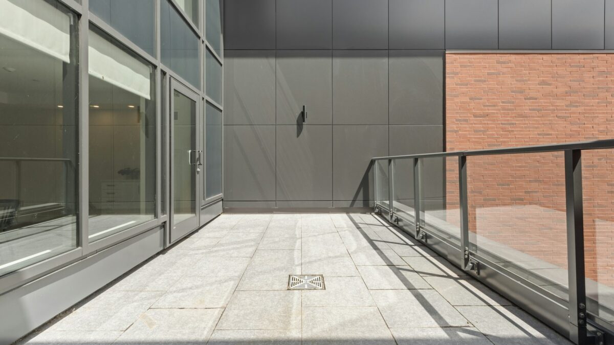 stainless steel railings near glass window