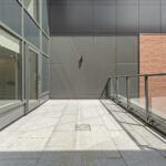 stainless steel railings near glass window