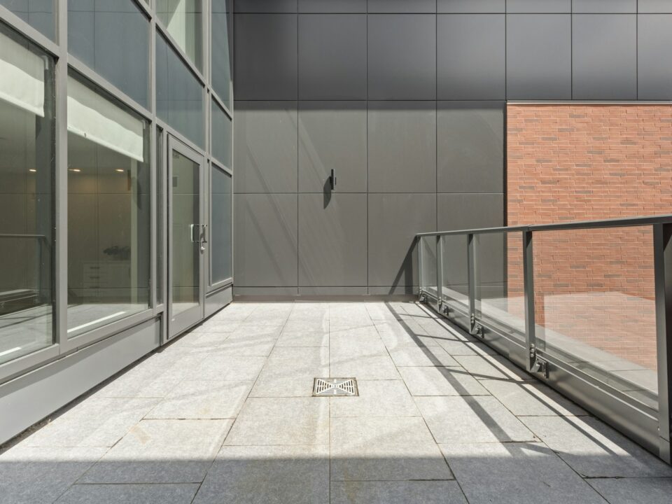 stainless steel railings near glass window